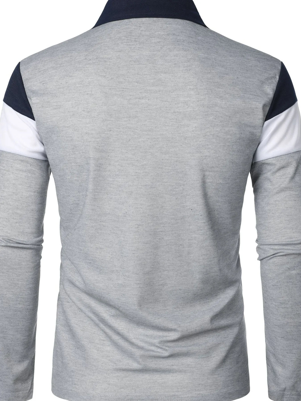 Men's color block long sleeve polo shirt in plus size by Trendsi, featuring a stylish design and vibrant color blocks.