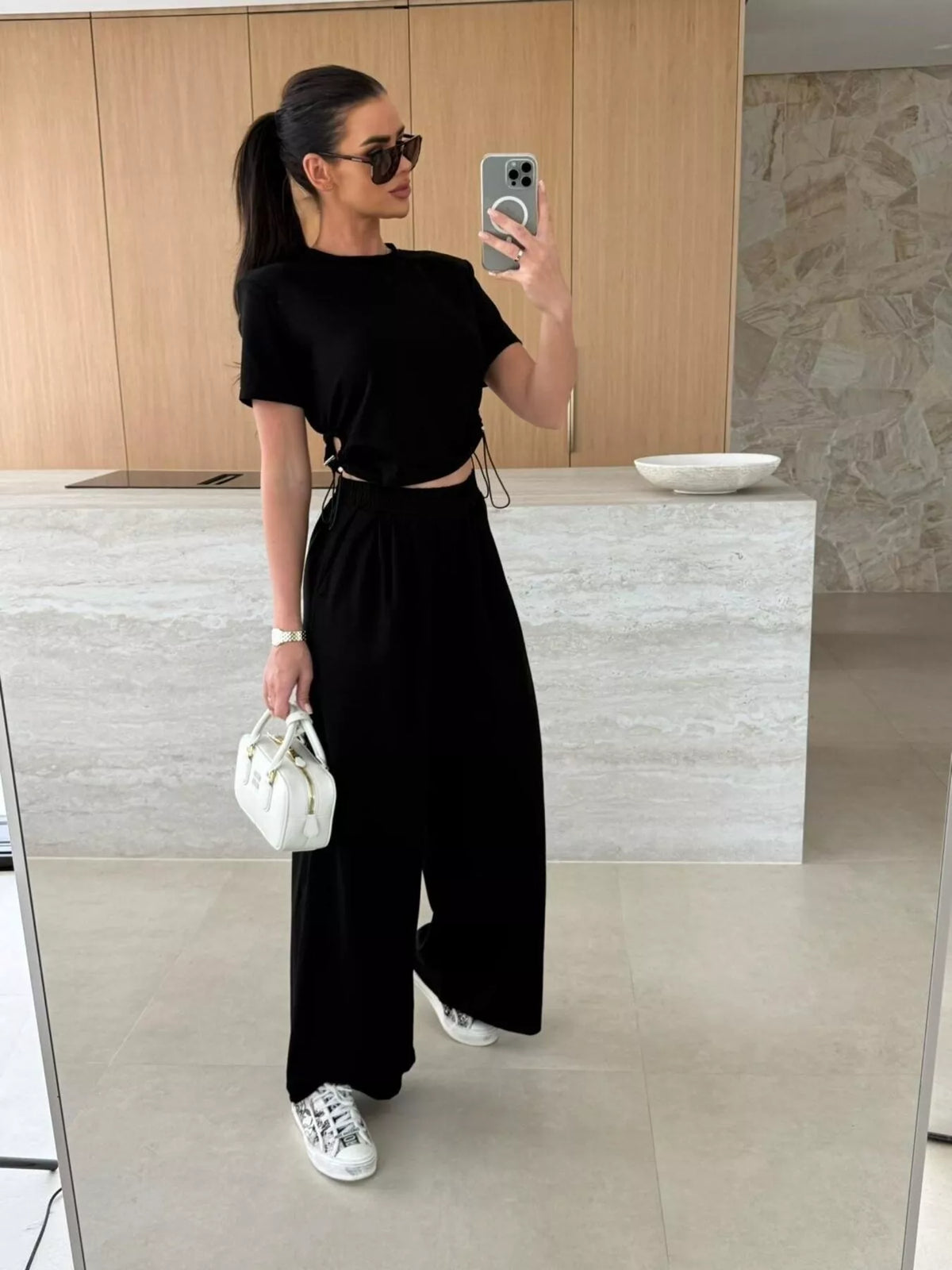 Drawstring crop top and wide-leg pants set by Plush Fashion Hub, featuring a stylish matching ensemble with comfortable fit.