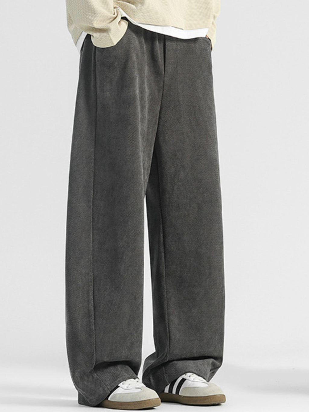 Men's loose fit pocket pants by Trendsi, plus size casual trousers with a comfortable, relaxed fit and functional front pockets.