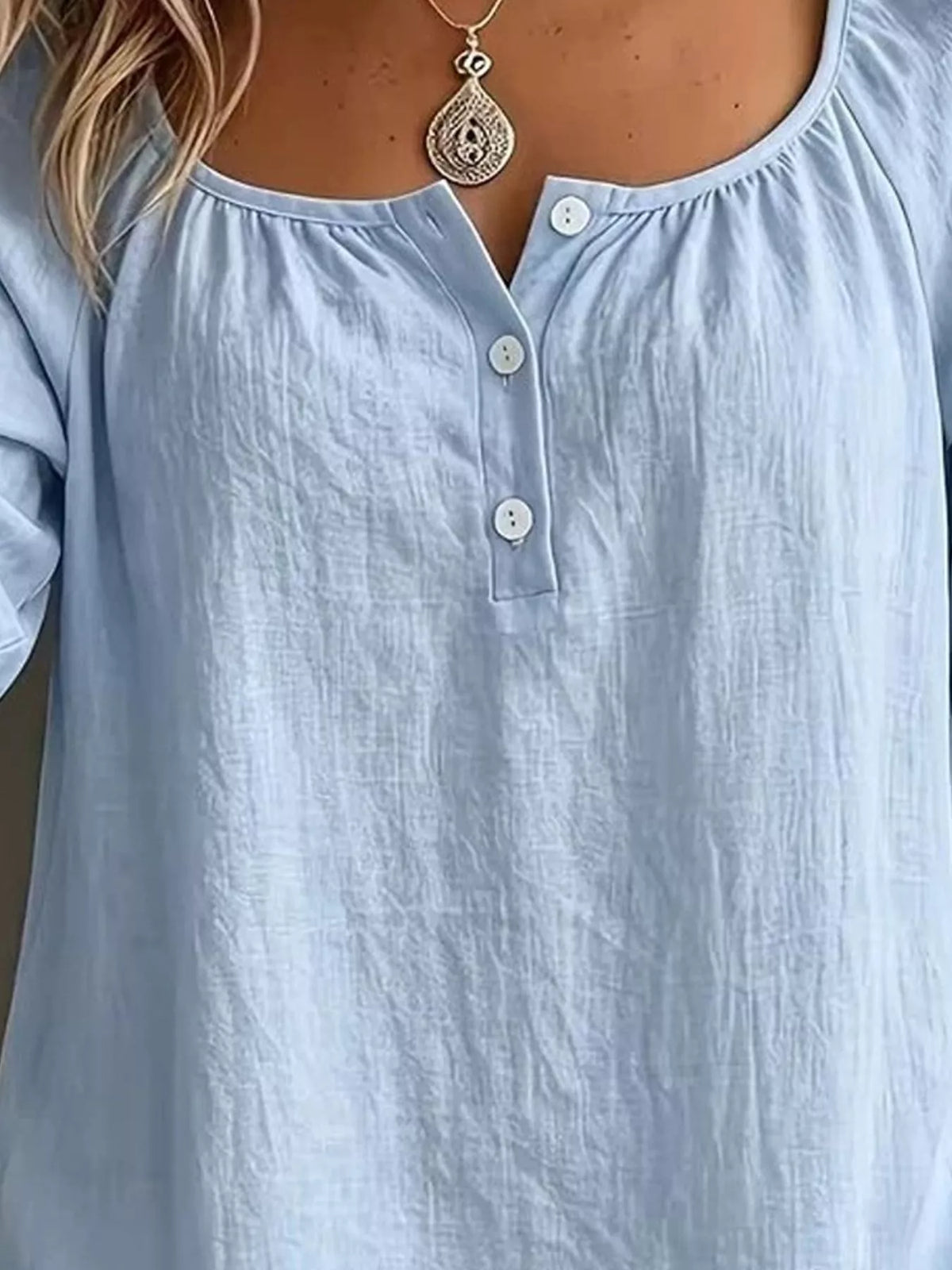 Plush Fashion Hub long sleeve top with button details, made from soft plush fabric, featuring a stylish and comfortable design