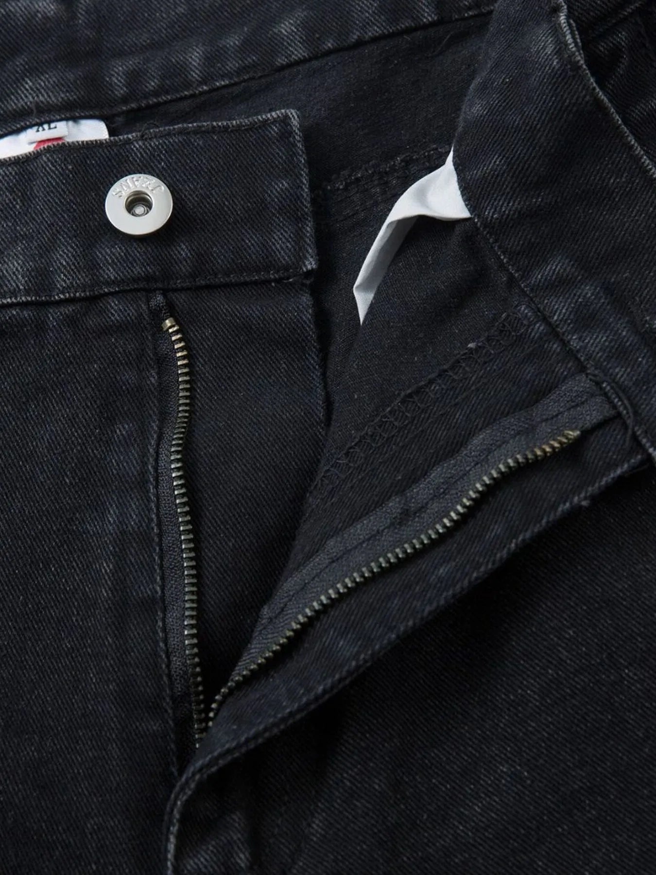 Men's wide leg denim jeans by Plush Fashion Shop, showing the relaxed fit and classic blue denim fabric.