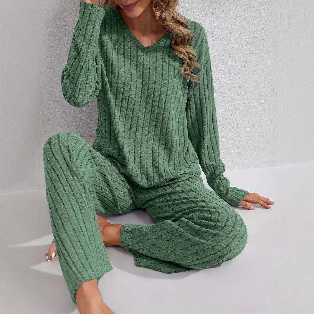 Women’s ribbed long sleeve top and pants loungewear set by FitiqueFit, featuring a comfortable casualwear look in soft, stretchy fabric.