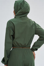 Svelte UV protection crop hoodie by Fitglutes Activewear, showing a fitted athletic hoodie with UV shield fabric and sporty design.