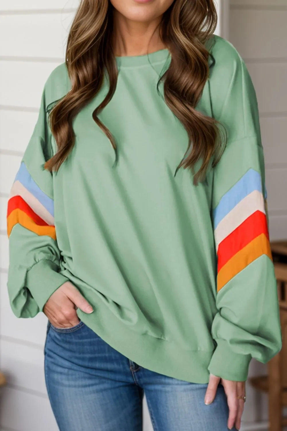 Contrast round neck long sleeve sweatshirt from Trendsi, shown in a stylish casual top with contrasting details and a comfortable fit.