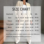 Women’s FitiqueFit 2-piece zip-up sweatsuit set with a casual jacket and wide-leg sweatpants, shown in a comfortable, relaxed fit.