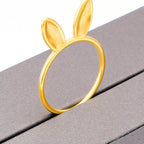 18K gold-plated bunny ear ring featuring a cute bunny design, from Shopimist, on a plain background.