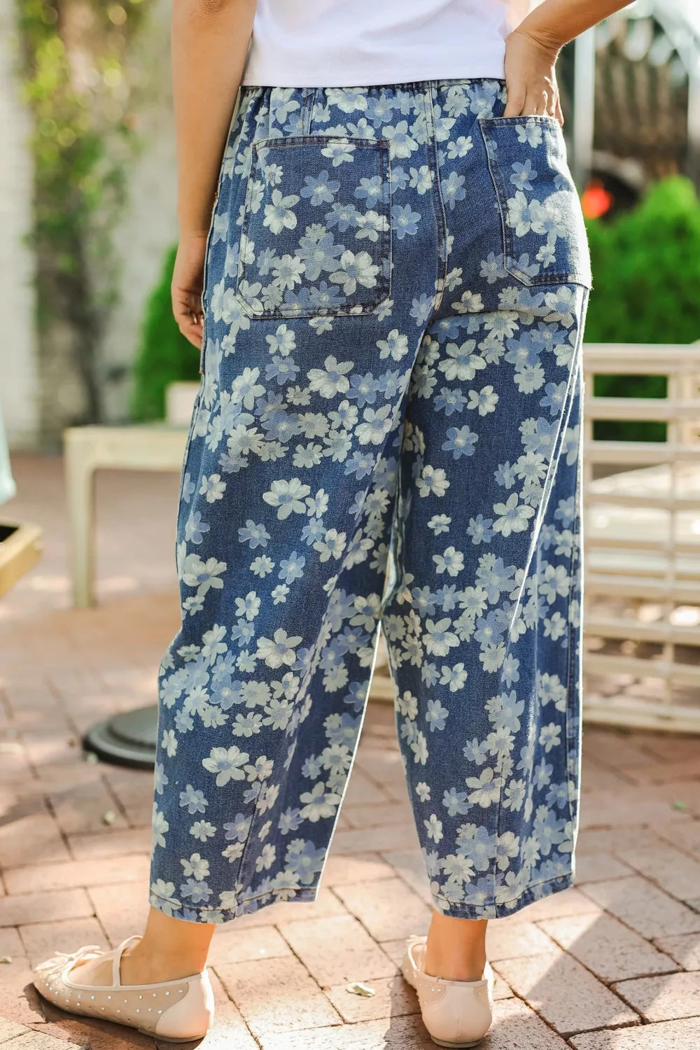 Dainty floral printed drawstring barrel jeans by Plush Fashion Hub featuring a relaxed fit and floral pattern design.
