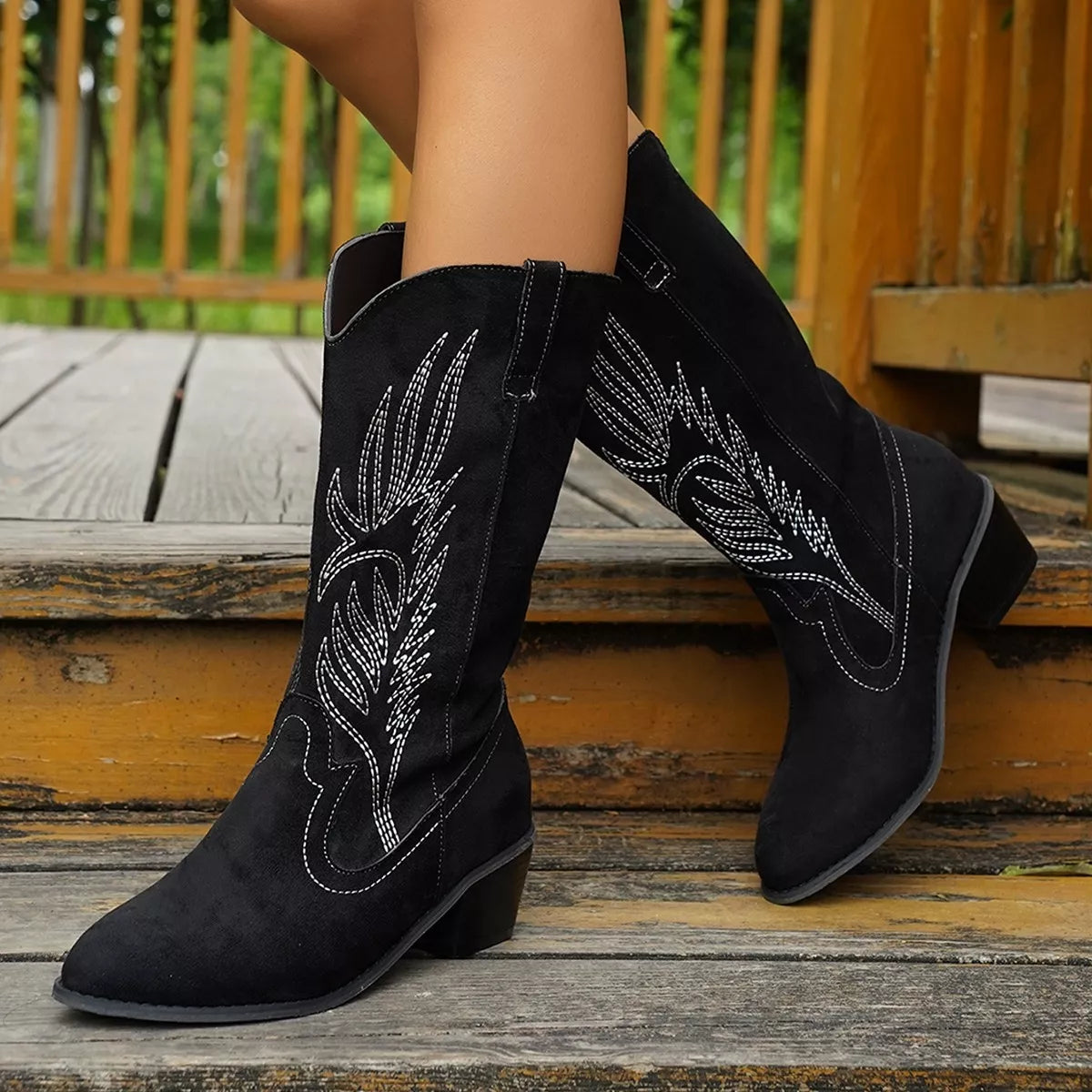 Point toe block heel boots by Trendsi featuring sleek design, ankle height, and stylish silhouette for versatile fashion.