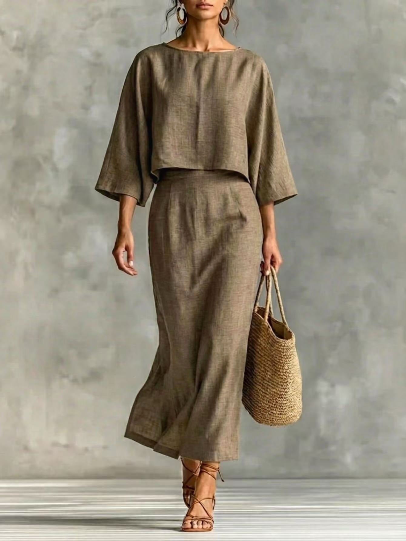 Casualwear set featuring a high waist long skirt and 3/4 sleeve loose top from Plush Fashion Hub, shown in a relaxed fit.
