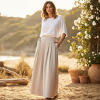 Women's high-waist pleated wide-leg linen pants by FitiqueFit, relaxed bohemian casualwear with a comfortable fit.