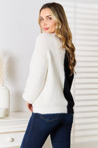 Women's contrast button-front V-neck knit cardigan by Trendsi featuring angel wing woven details and chic layering style.