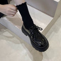 Women’s British style chunky sole leather loafers with elevated heel, trendy footwear by FitiqueFit featuring classic design details.