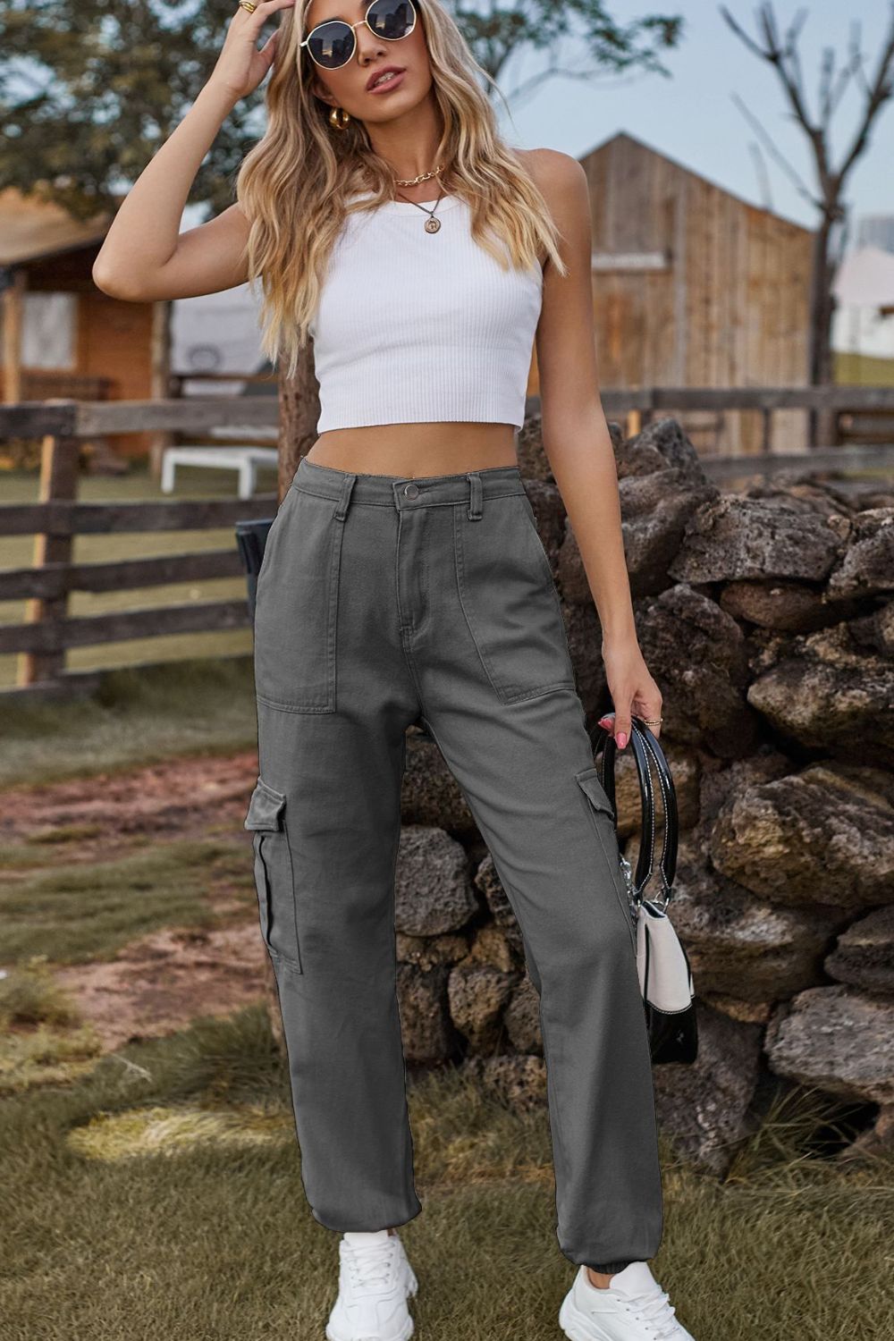 Long denim jeans with pockets from Plush Fashion Shop, showing the classic fit and detailed pocket design.