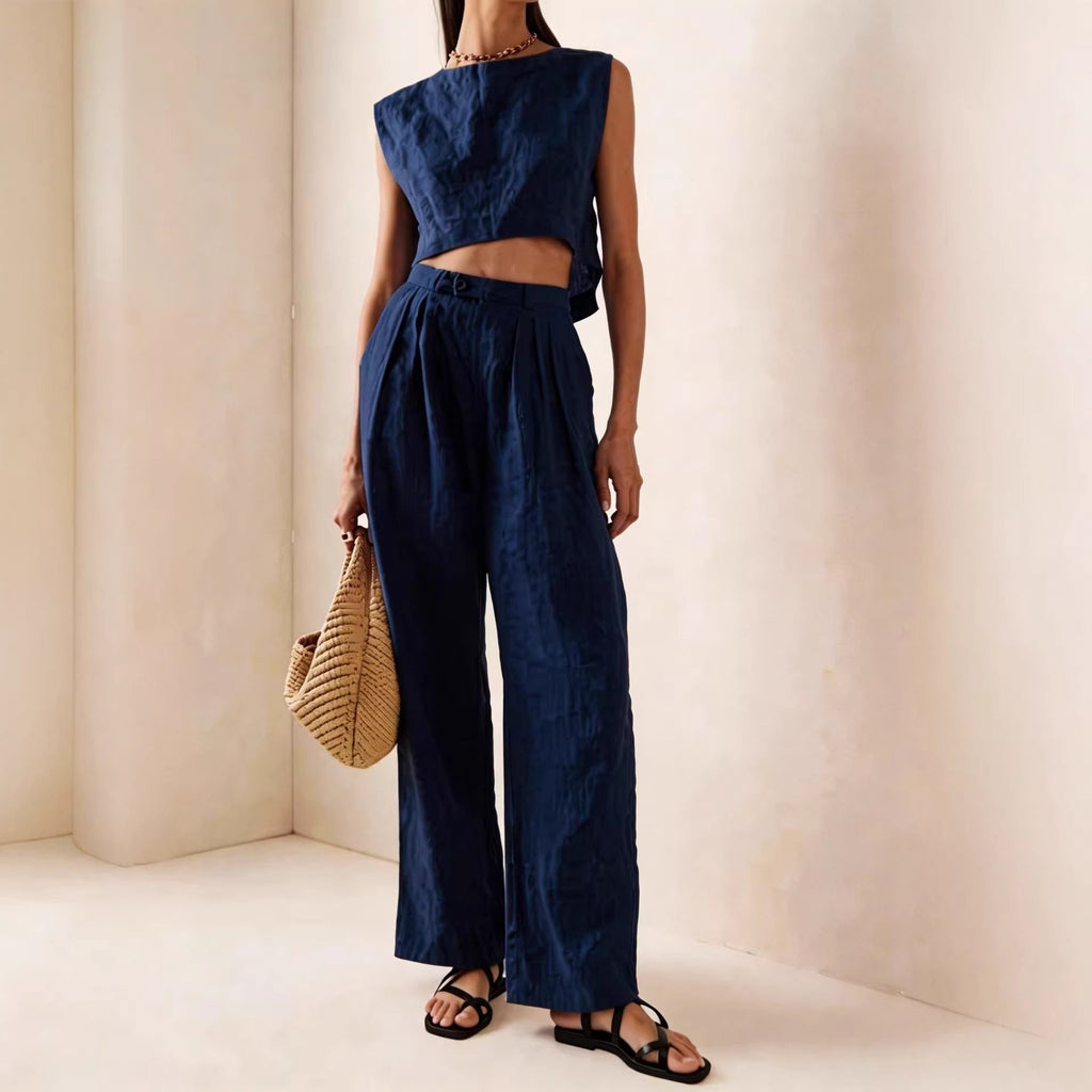 Women's breathable crew-neck casual two-piece set with T-shirt and pants from Plush Fashion Hub, displayed on a model.
