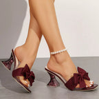 Open toe bow sandals by Shopimist featuring stylish design with open toes and decorative bows on soft, comfortable straps.