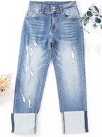 High waist distressed straight leg jeans from Trendsi, featuring a classic denim look with ripped details and a fitted silhouette.