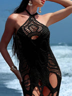 Cutout halter neck cover-up dress from Trendsi featuring a stylish design, open back, and flowing fabric perfect for beachwear.