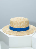 Plush Fashion Hub classic wheat straw boater hat with decorative ribbon, perfect for elegant summer fashion accessories.