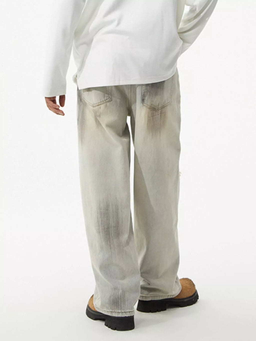 Men's distressed wide-leg jeans by Trendsi, featuring a relaxed fit and faded, ripped details on lightweight denim.