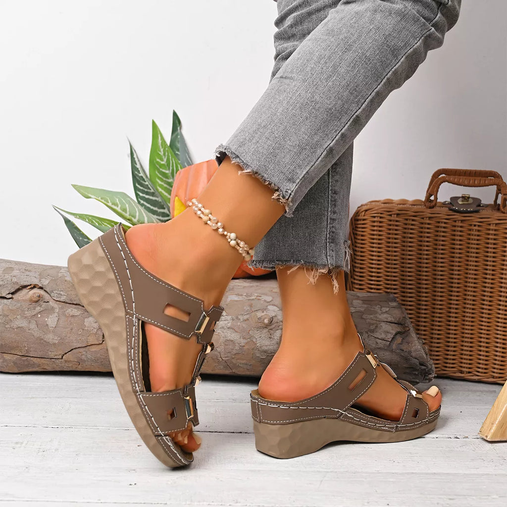 Open toe wedge sandals by Shopimist featuring a stylish design with a comfortable heel and ankle straps.