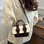 Stylish small square LadyShow.Store crossbody bag with versatile design, featuring a compact underarm carry style and trendy details.
