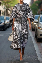 Geometric print batwing sleeve flowy maxi dress from Plush Fashion Hub, casualwear, available in XS to XXXL sizes.
