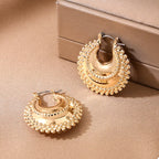 18K gold-plated alloy crescent moon hoop earrings with a sleek, modern design, perfect for stylish accessories.