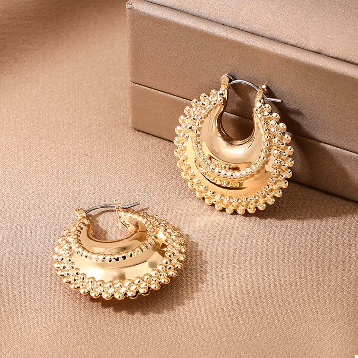 18K gold-plated alloy crescent moon hoop earrings with a sleek, modern design, perfect for stylish accessories.