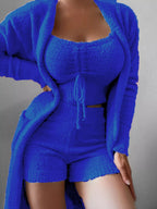 Plus size cozy plush top, shorts, and cardigan 3-piece set by Trendsi, featuring soft fabric and relaxed fit for comfort.