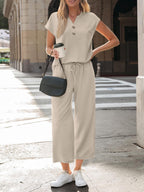 Women's notched short sleeve lounge set with pockets, 2-piece casual sleepwear by Trendsi, shown in a relaxed fit with comfortable fabric.