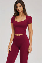 Fitglutes activewear flared leggings and T-shirt set, stylish gymwear featuring comfortable fabric and trendy design for workouts.