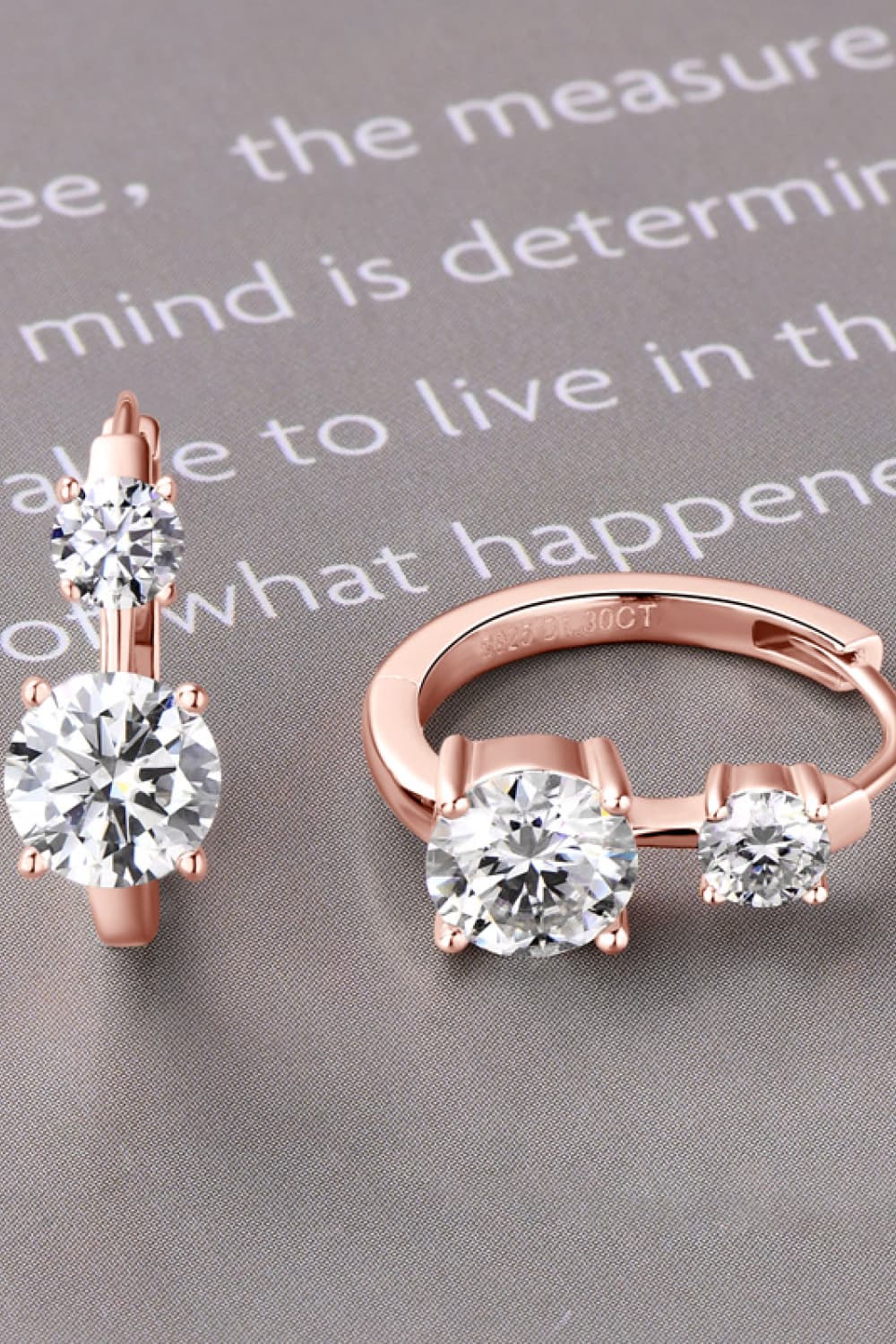 Sterling silver moissanite earrings with 1.3 carats, featuring sparkling gemstone accents and elegant design.