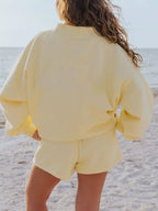 Plush Fashion Hub relaxed fit round neck sweatshirt and shorts set, 2-piece casual loungewear set, soft fabric, comfortable fit.