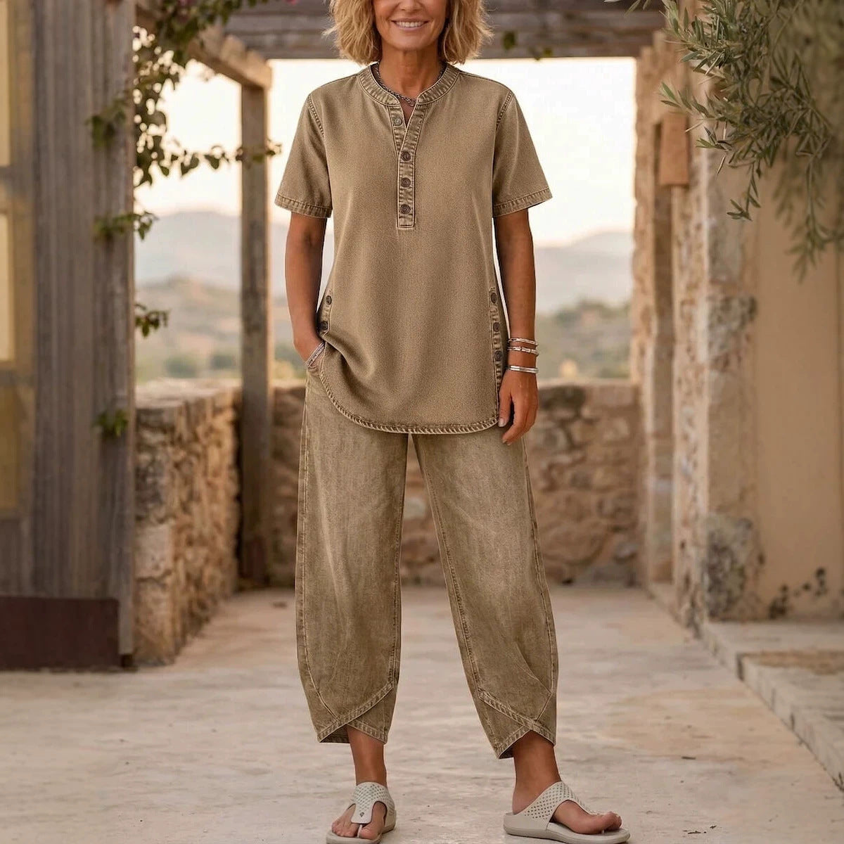 Women's FitiqueFit two-piece set with lapel button-up top and matching pants, featuring three-quarter sleeves.