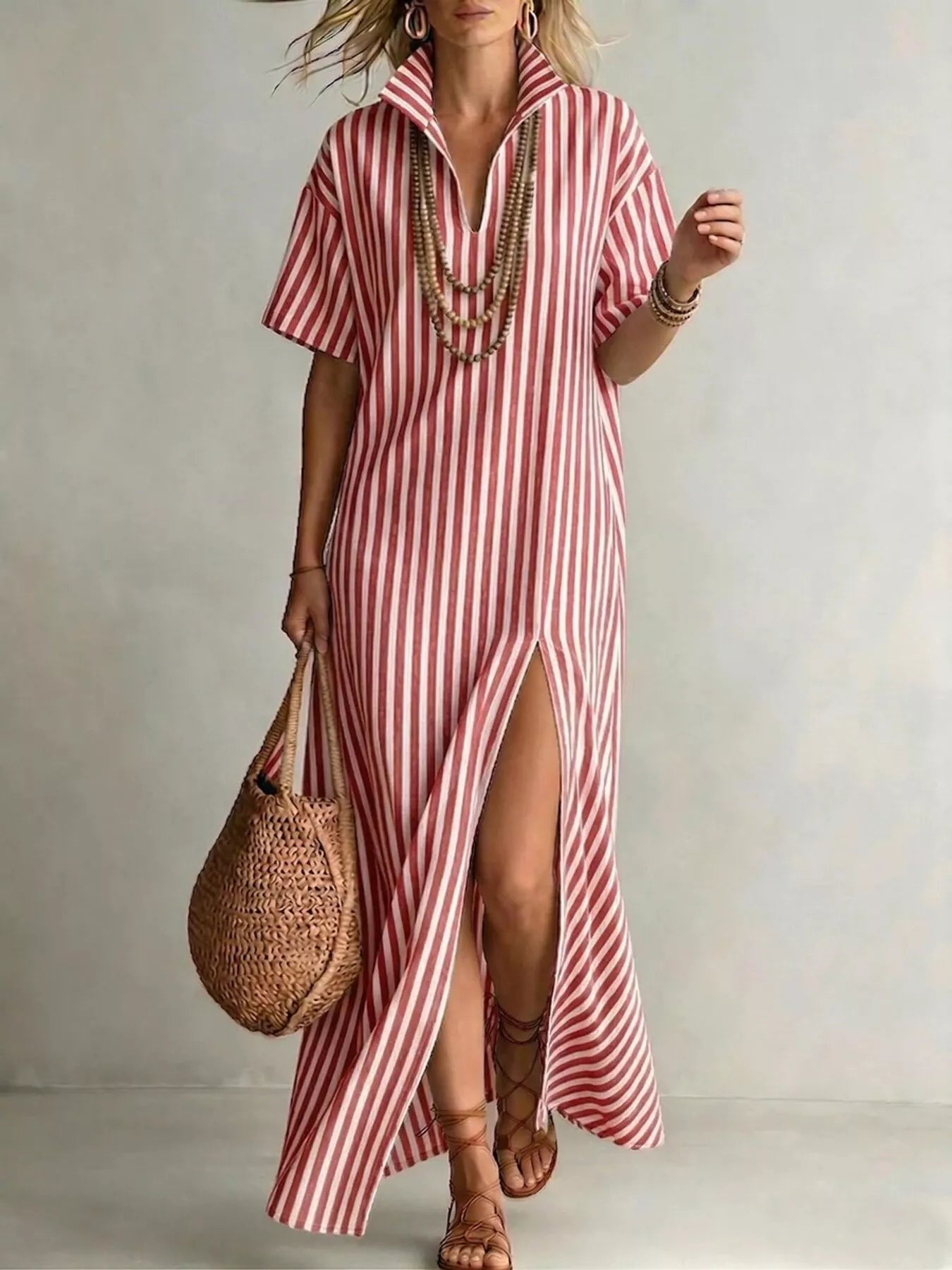 Striped high slit maxi shirt dress from Trendsi showcasing a flowy design with a daring side slit and collar neckline.