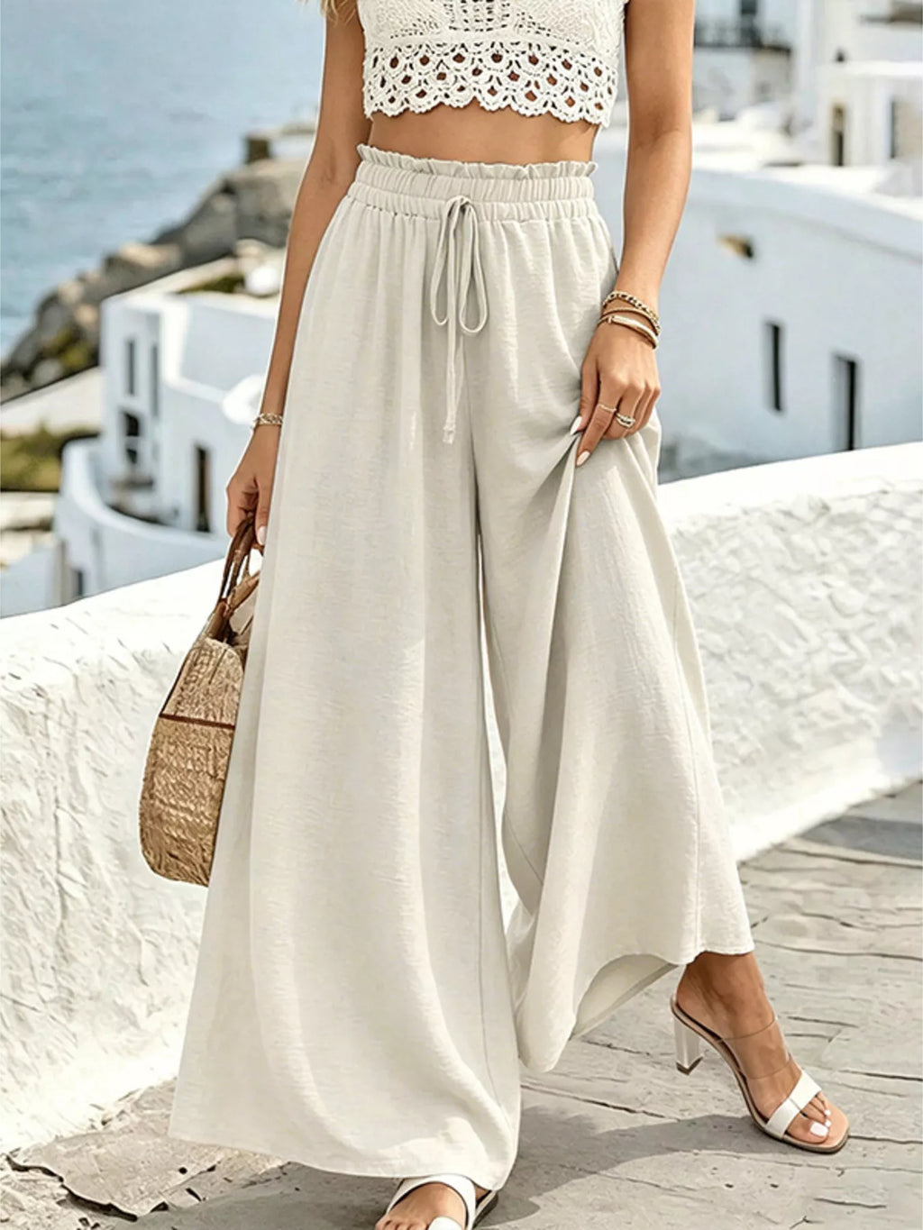 Wide leg drawstring pants by Shopimist, featuring relaxed fit and adjustable waistband, shown in a neutral fabric.