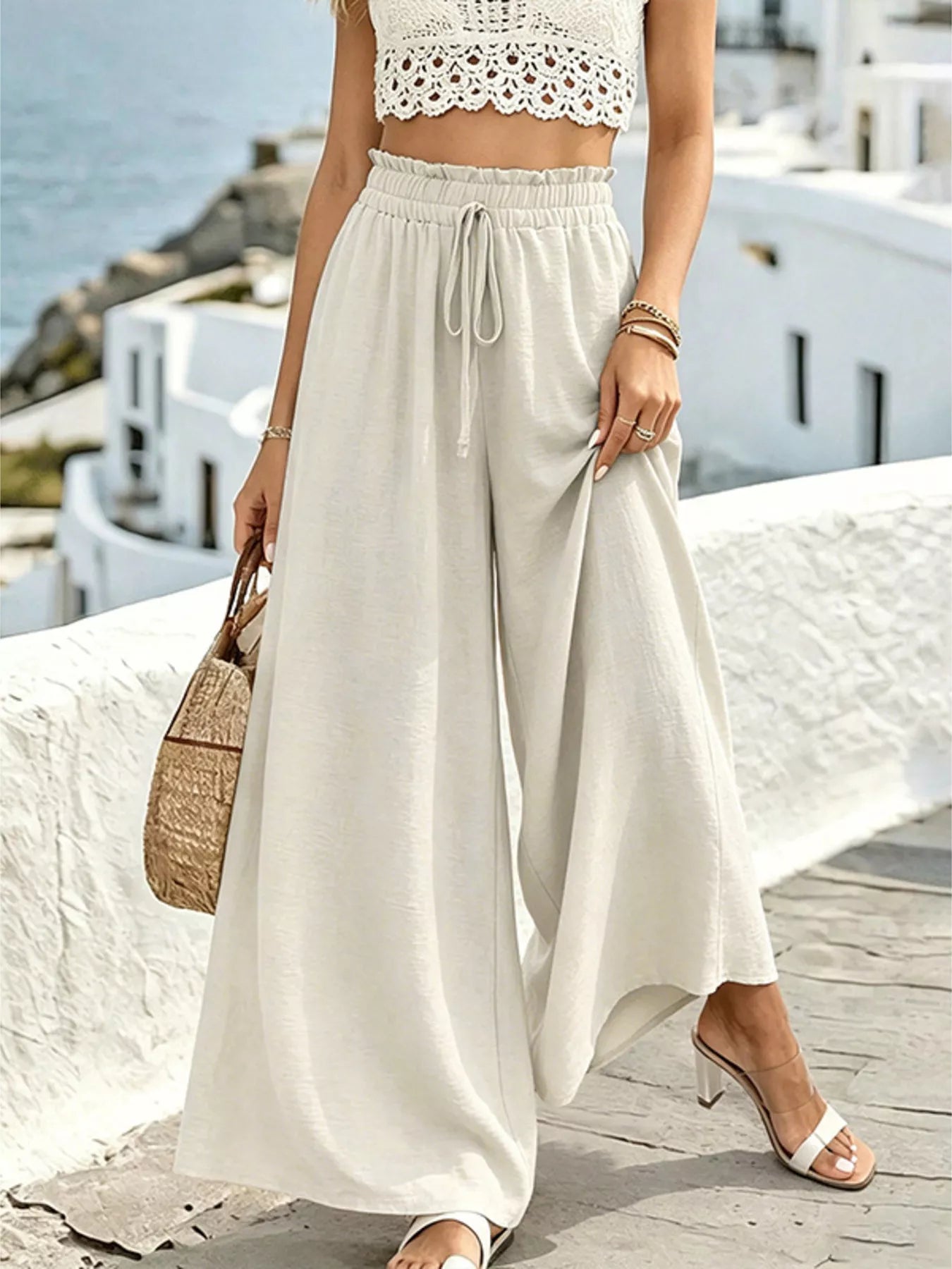 Wide leg drawstring pants by Shopimist, featuring relaxed fit and adjustable waistband, shown in a neutral fabric.