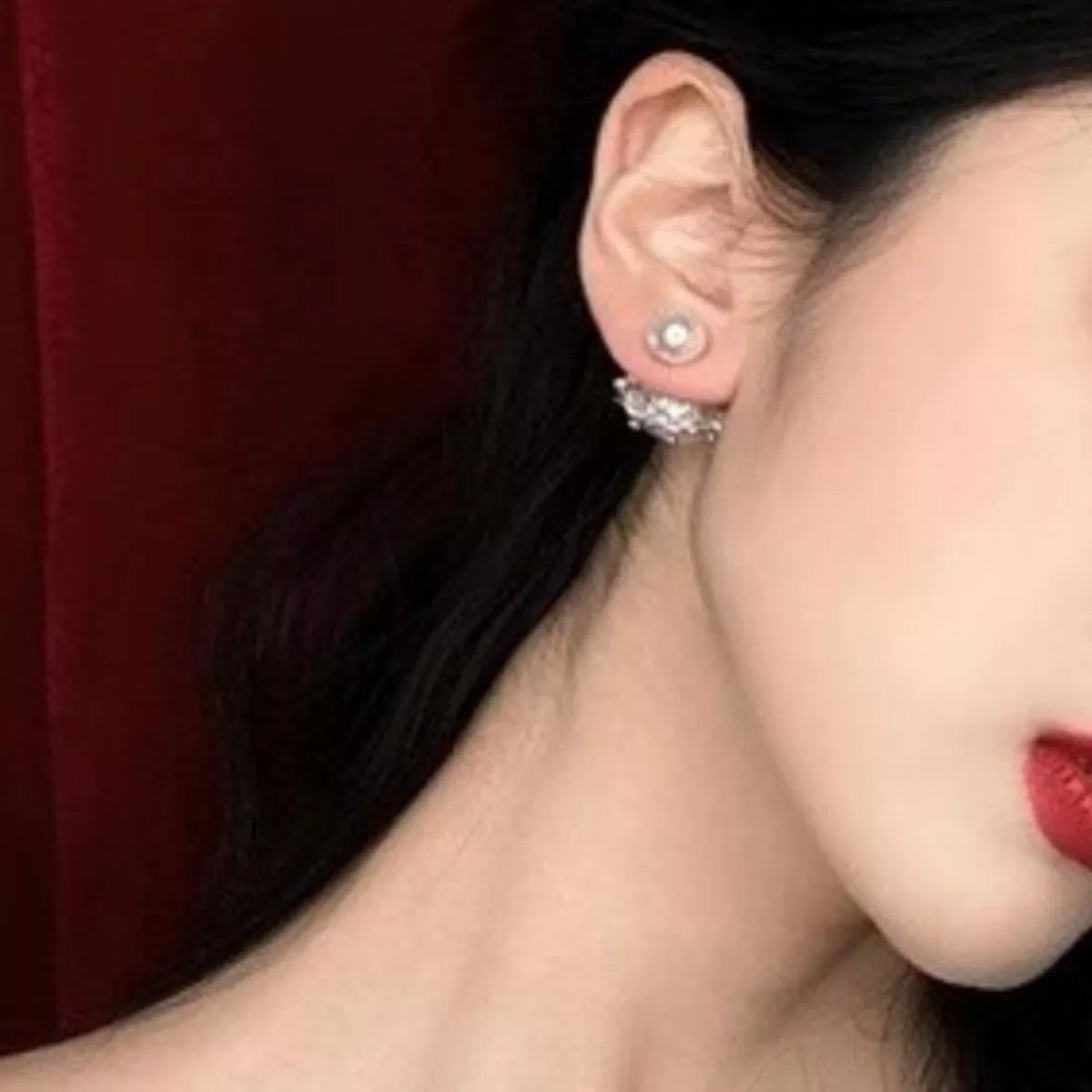 Elegant pearl stud earring from Plush Fashion Hub, featuring a classic round design and shiny pearl centerpiece.