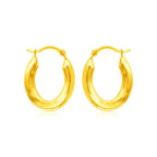 14k yellow gold polished oval hoop earrings with smooth finish, stylish jewelry by Plush Fashion Hub