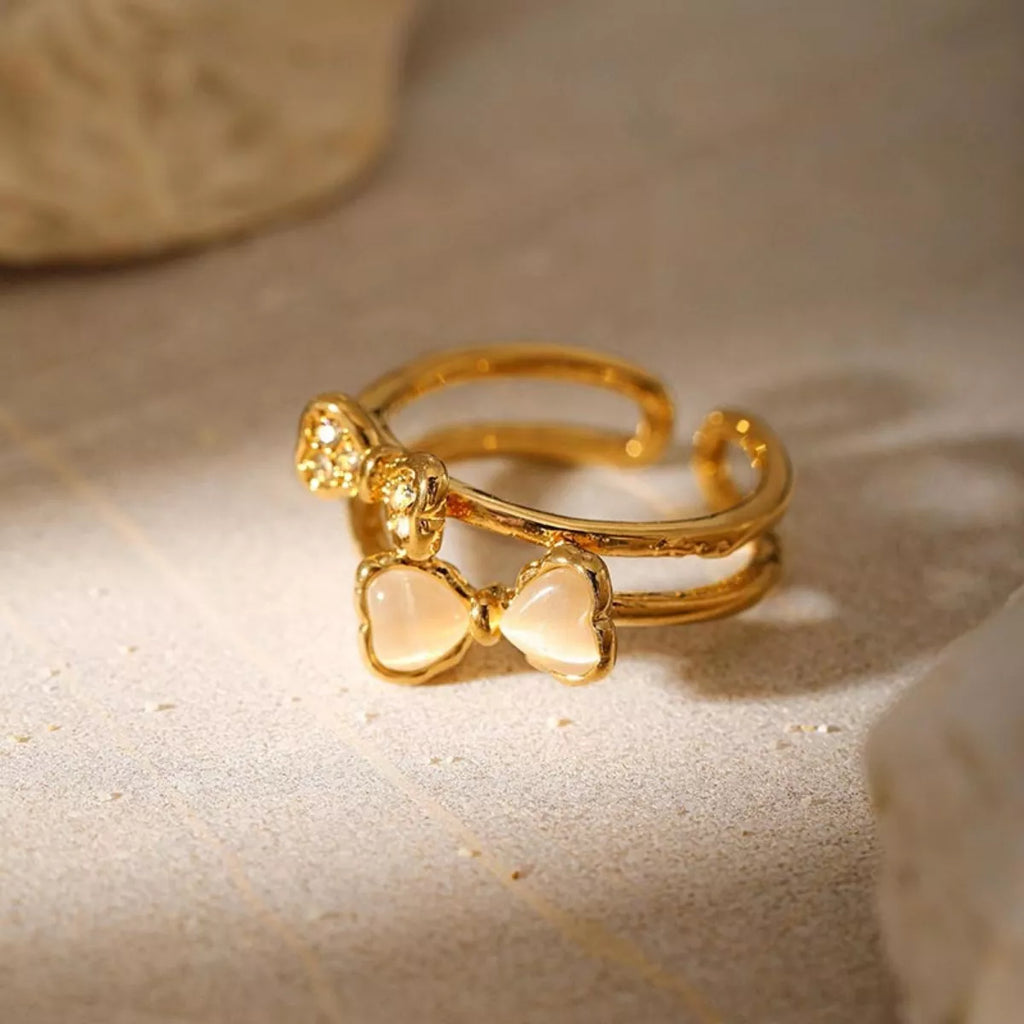 18K gold-plated bow open ring with sleek design, featuring a delicate bow detail, perfect for elegant jewelry collection.