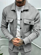 Men's plus size button-up long sleeve jacket by Shopimist, showing the full front view in dark fabric with collar and button details.
