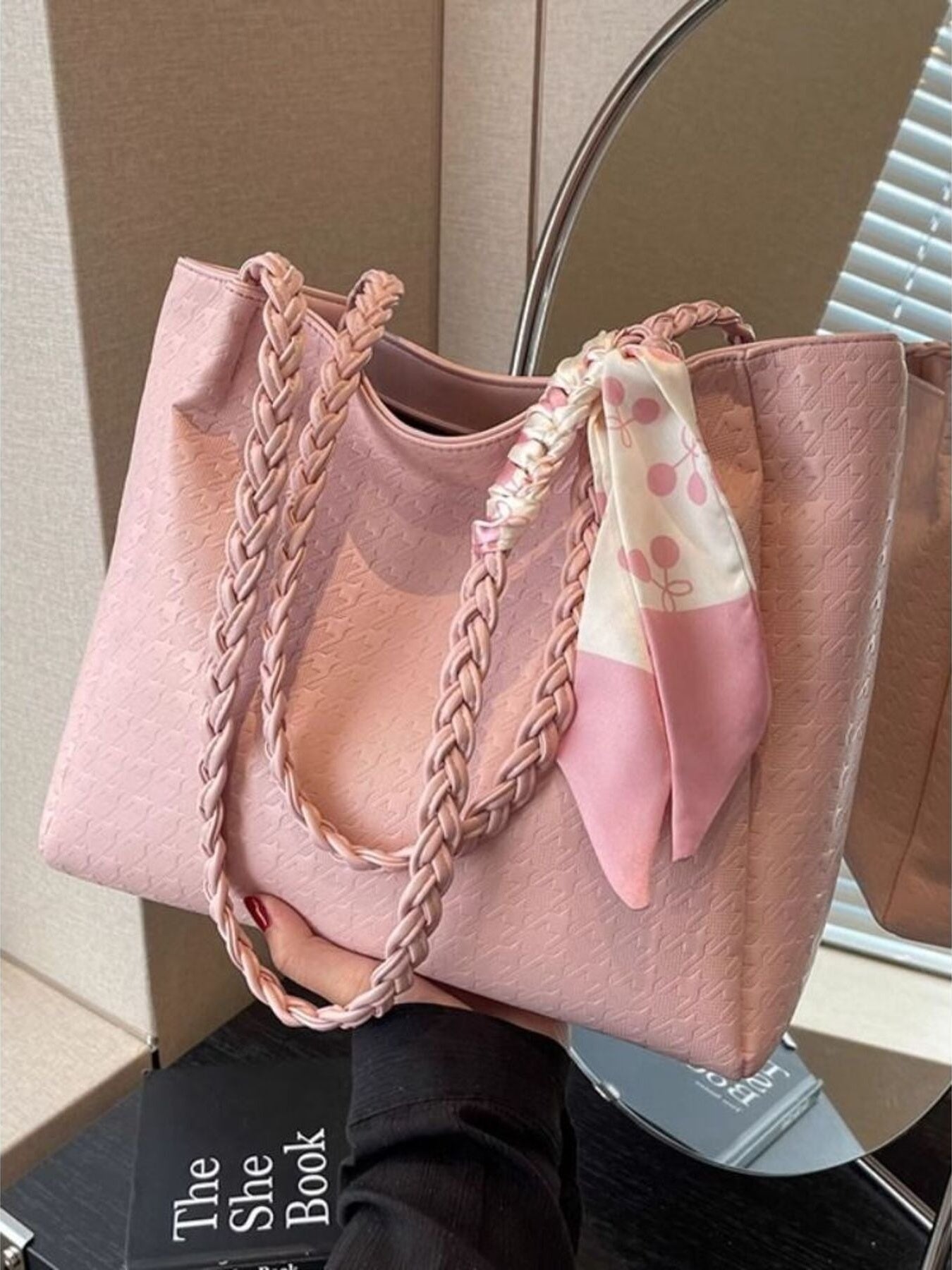 Plush Fashion Hub braided handle tote bag with woven design and spacious interior, perfect for everyday use.