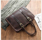 Women's hand-woven leather handbag with vegetable-tanned full-grain cowhide, featuring intricate craftsmanship and natural leather finish.