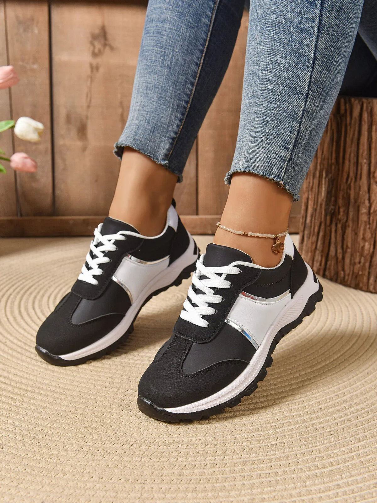 Contrast lace-up sneakers with stylish design, featuring trendy footwear from Trendsi, shown in a sleek, modern style.