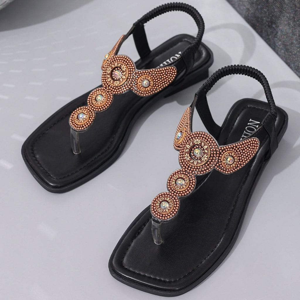Beaded T-strap flat sandals by Shopimist featuring colorful beaded straps and comfortable flat sole.