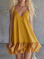 Plus size full-length V-neck bubble hem mini dress by Shopimist, showcasing a stylish and comfortable dress with a fitted silhouette.
