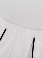 Contrast trim sleeveless top and wide-leg pants set by Shopimist, featuring a stylish, modern design with bold color accents.