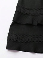 Lace detail V-neck mini dress from Shopimist featuring delicate lace accents and a fitted silhouette.
