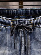 Men's relaxed fit drawstring jeans in plus size by Shopimist, showing the comfortable, full-length denim with adjustable waistband.