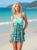 Women's printed swimsuit by FitiqueFit, sleeveless one-piece casualwear dress-style swimwear with vibrant pattern and comfortable fit.